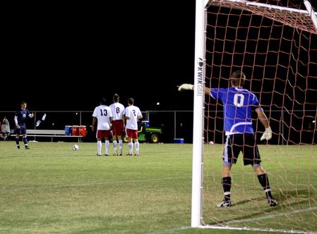 Bulldog soccer players prepare to block a direct kick from Mid-Continent University during an October game.  - Photo by Ebbie Davis