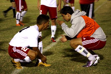 Cody Styx talks with teammate Brian Castro after the Bulldog soccer game against Mid-Continent University. - Photo by Ebbie Davis