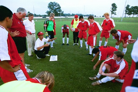 Pregame instructions from Coach Darin White
 - Photo by Jim Veneman