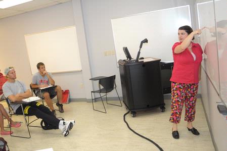 Victoria Malone, instructor of language, teaches class.  - Photo by Morris Abernathy