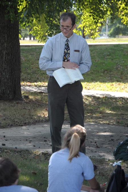 Bobby Rogers, professor of English, teaches class outside on a nice Fall day.  - Photo by Morris Abernathy