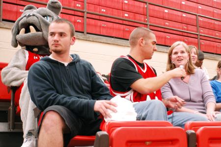 Junior Jeff Reese (center) interviews SGA President Kristen Ulmer during Meet the Bulldogs while Buster and Titus Bartos keep watch. - Photo by Kristen Nicole Sayres