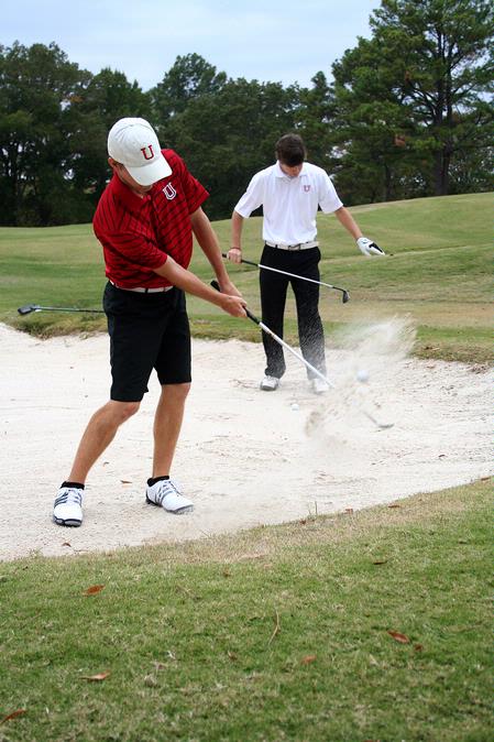 Brett Barry, sophomore sports management major, practices his putting during a Union golf practice.  - Photo by Deanna Santangelo