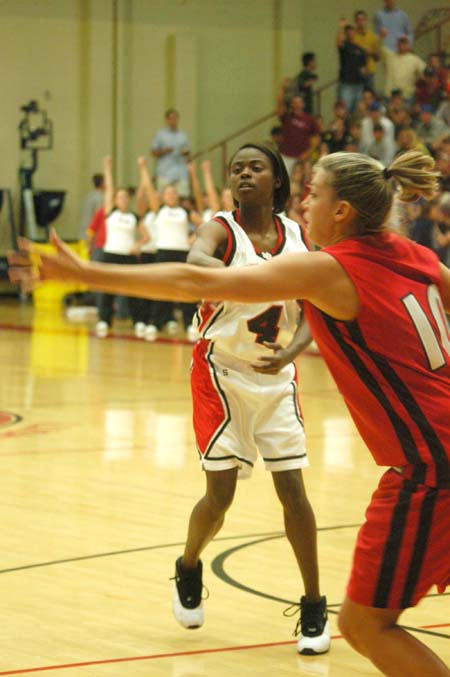 Senior guard Jessica Henson (10) goes for the steal against her fellow Lady Bulldog, LaTorya Fuller (4) during the Bulldog Madness scrimmage. - Photo by Courtney Ross