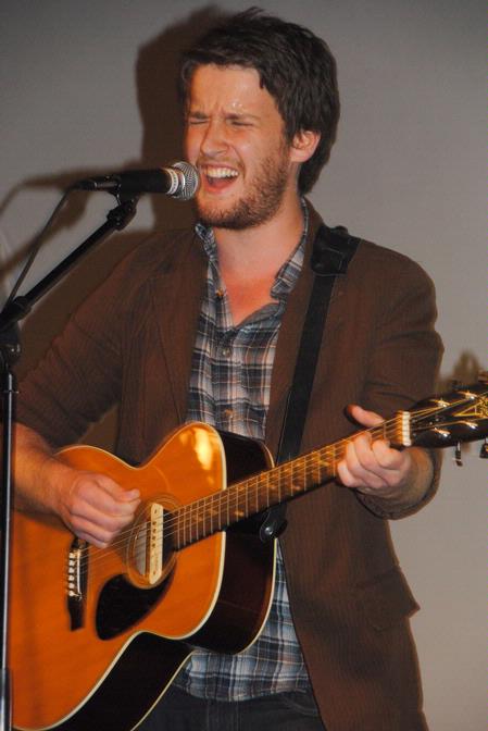 TJ Hester, junior philosophy major, opens for the The Civil Wars at Barefoots Joe. - Photo by Victoria Stargel