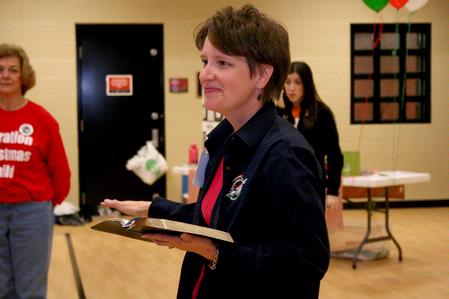 Tracie Barnard, volunteer community relations specialist, talks to Union volunteers about the impact of Operation Christmas Child during Campus and Community Day. - Photo by Deanna Santangelo