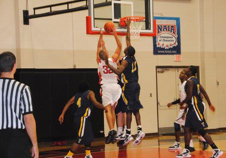 Veljko Petrovic goes up for a shot against Truett-McConnell College in the homecoming game. The Bulldogs won the game 79-69. - Photo by Victoria Stargel