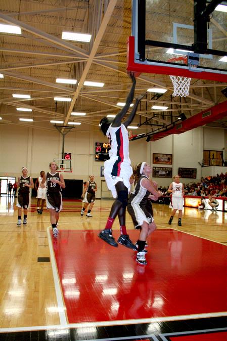 Zeinab "Sarah" Chan shoots a layup during the homecoming game against University of St. Francis. The Lady Bulldogs won the game 83-57.  - Photo by Deanna Santangelo