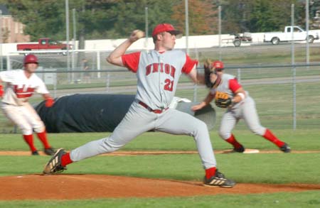 Junior pitcher Eric Vanderburg (21) makes a pitch during the Intersquad World Series.   - Photo by Steven Aldridge