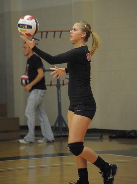 Lauren Sprouse serves the ball. - Photo by Morris Abernathy