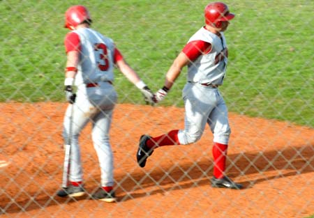 Josh Allen (11) gets a congrats from Garrett Pepper (3) after his home run during the Union Intersquad World Series. - Photo by Steven Aldridge