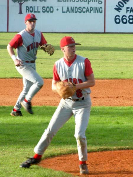 Senior pitcher/infielder David Canary (6) fields a comebacker during a relief appearance in the Intersquad World Series.  Third baseman Garrett Pepper (3) looks on. - Photo by Steven Aldridge
