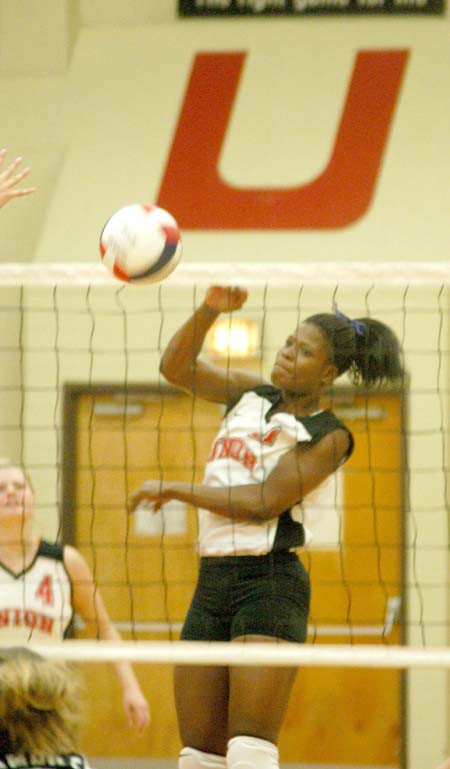 Lady Bulldog junior Gladys Wandera records one of her team leading kills in Union's 3-0 win over Lambuth. - Photo by Steven Aldridge