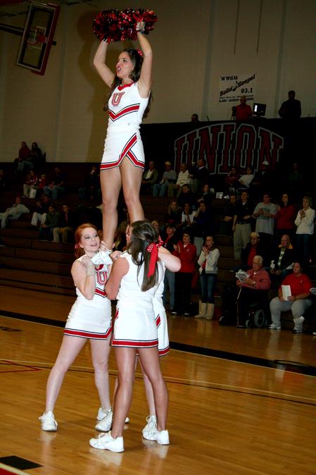 Cheerleaders get the crowd pumped up before the Lady Bulldogs play against Oklahoma Baptist University in the first game of the 17th Annual Jackson Rotary Classic. Union defeated Oklahoma 76-62. - Photo by Deanna Santangelo