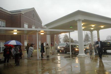 Rainy weather welcomes students, faculty and family members at West Jackson Baptist Church for the 2010 Fall Commencement Services. - Photo by Beth Spain