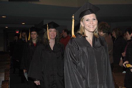 Students walk to their seats as the 2010 Fall Commencement Services begin at West Jackson Baptist Church. - Photo by Beth Spain
