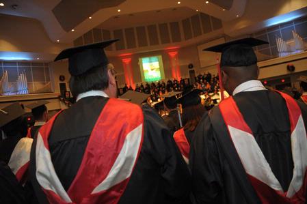 345 students wait to receive their diplomas at the 2010 Fall Commencement Services.  - Photo by Morris Abernathy