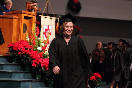 Emily Taylor, nursing graduate, smiles after receiving her diploma at the 2010 Fall Commencement Services.  - Photo by Kristi McMurry Woody