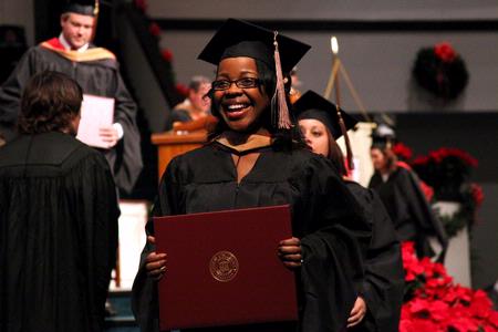 Renee Jones, assistant director of recruitment & information technology, receives her MBA at the 2010 Fall Commencement Services.  - Photo by Kristi McMurry Woody