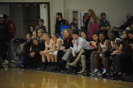 Coach Mark Campbell watches the game intently as the Lady Bulldogs put win number 17 in the books. - Photo by Morris Abernathy