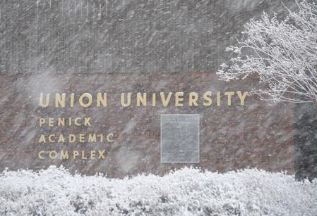 Penick Academic Complex on a cold winter day during heavy snowfall. - Photo by Morris Abernathy