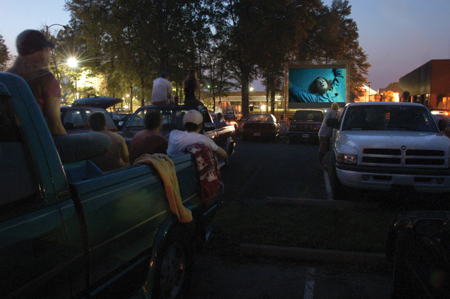 Students enjoy watching <i>Catch Me If You Can</i> during a drive-in movie sposored by SAC. - Photo by Jim Veneman