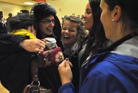A group of students greet each other after the Christmas break and January term at the annual Holla Back party. - Photo by Victoria Stargel