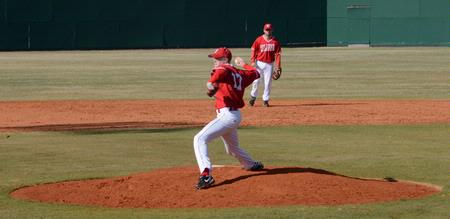 Matt Fike pitches in a double header against Oklahoma Wesleyan University. The Bulldogs were happy to have a nice sunny day to play ball and won both games.  - Photo by Victoria Stargel