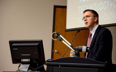 Justin Barnard, director of Carl F H Henry center for Christian leadership, makes introductions at the Town & Gown lecture series.  - Photo by Deanna Santangelo