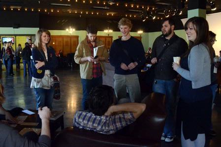 Joy Moore (far right), director of student programs, talks to students in Barefoots Joe.  - Photo by Beth Spain