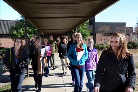 Student Ambassador Rachael Taylor, junior learning foundations major, takes prospective students to the Blasingame Academic Complex during a tour of the Union University campus.  - Photo by Victoria Stargel