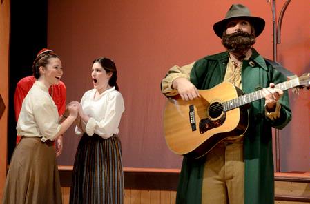 David Conway, junior history major, sings and plays guitar during a performance of "The Winter's Tale." - Photo by Deanna Santangelo