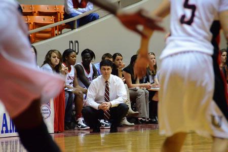 Mark Campbell, head coach, watches the Lady Bulldogs play defense against Avila University from Missiouri in game 1 of the 2011 NAIA Championship. - Photo by Beth Spain