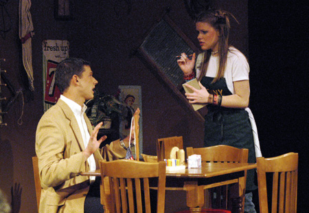 Courtney Braswell as Denny Standard serves Stephen Kennedy as Harvey Gold in <i>You Have To Serve Somebody</i>. - Photo by Jim Veneman