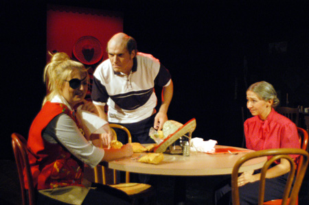 Molly Williams as Casssandra Hooper is consoled by Patrick Myers as Marvin Standard while Miranda Wallace as Millie Starndard looks on in <i>You Have To Serve Somebody</i>. - Photo by Jim Veneman