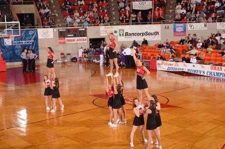The Union University cheerleaders get the crowd pumped up at the quarterfinals of the NAIA National Championship. - Photo by Morris Abernathy