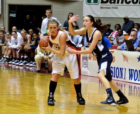 Kayla Hudson looks for a pass on offense in the semifinals game of the NAIA National Championship against Shawnee State University.  - Photo by Beth Spain
