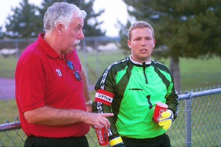 Bill Lean (left) and Jeff Lean (right) - Father and son talk it over - Photo by Jim Veneman