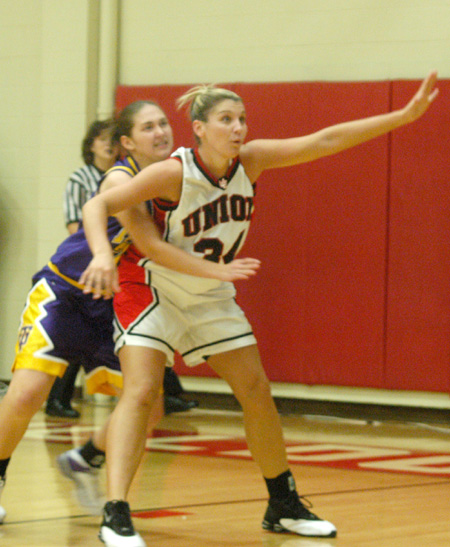 Molly York (34) prepares to get the ball in the post. - Photo by Courtney Ross