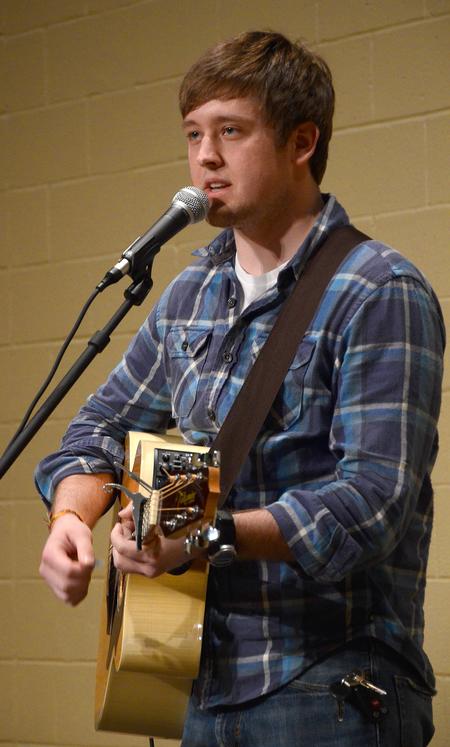 Shawn Chandler, senior biblical studies major, leads music at the beginning of the second night of Abraham's Altar.  - Photo by Victoria Stargel