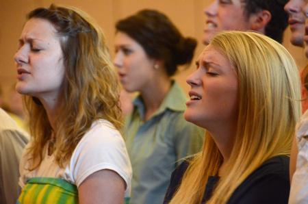 Students worship through song during chapel. - Photo by Beth Spain