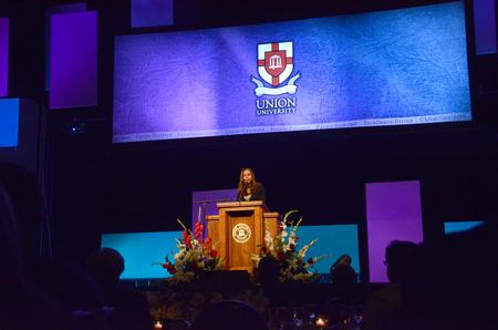 Lauren Dungy gives the opening remarks at the Roy L. White Golf and Gala.
 - Photo by Beth Spain