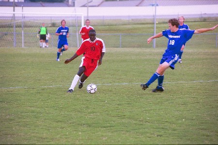 Joe Phiri, No. 10 - senior from Lusaka, Zambia - Photo by Jim Veneman
