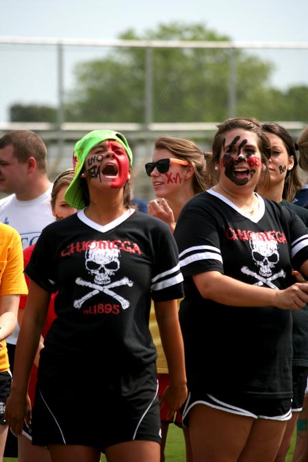 Claudia Chace, junior Christian studies major, and Lauren Surwic, senior elementary education major, cheer on their Chi Omega sisters during Greek Olympics. - Photo by Deanna Santangelo