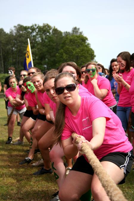 Angela Patterson, senior social work major, leads her Kappa Delta sisters in the rope pull competition during Greek Olympics. - Photo by Deanna Santangelo