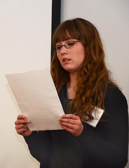 Whitney Williams, junior Christian studies major, presents her group's creative end to The Mystery of Edwin Drood, a Dickens' novel, for the Union University Scholarship Symposium.  - Photo by Victoria Stargel