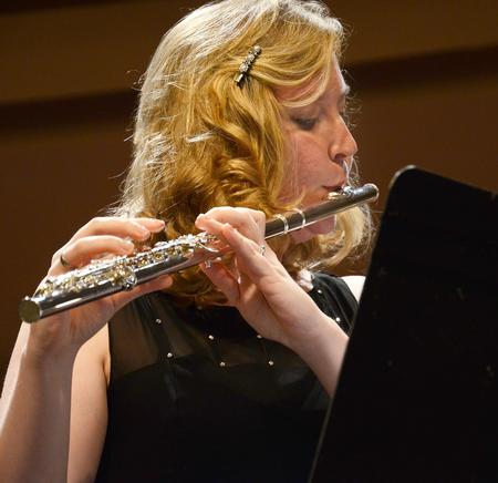 Kayleigh Hines, senior music and education major, performs a flute solo as the Union University Symphonic Band gives their Spring Concert in the Savage Memorial Chapel.  - Photo by Victoria Stargel