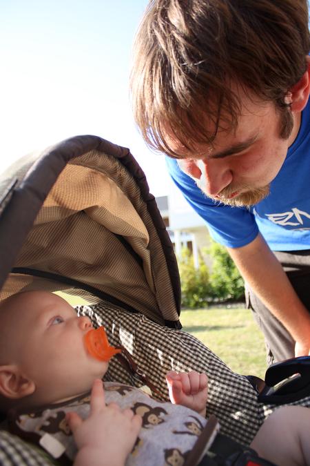 Beau Fant, freshman political science major, makes a funny face at Titus Jackson, son of Residence Director Ashley Jackson, during May Day, an event hosted by SAC. - Photo by Zac Calvert