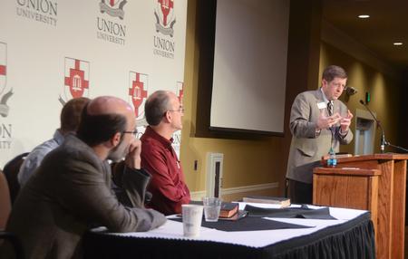 Ray Van Neste, director of the R.C. Ryan Center for Biblical Studies, leads a panel discussion at the Read the Bible for Life Conference. - Photo by Morris Abernathy