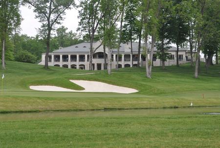 TPC Deere Run Clubhouse with 18th green in the foreground. - Photo by Steven Aldridge